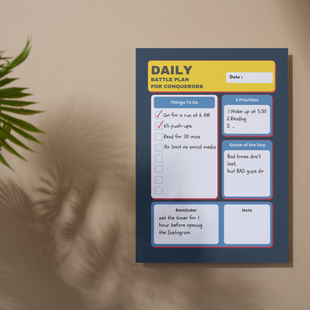 A minimalist daily planner sheet titled "Daily Battle Plan for Conquerors," mounted on a wall with soft shadows of plants in the background. The planner includes sections for "Things to Do," listing tasks like "Go for a run at 6 AM" and "65 push-ups," along with "3 Priorities," "Quote of the Day," featuring "Bad times don't last, but BAD guys do," and "Reminder" about limiting Instagram use. This design focuses on productivity, stress management, and motivation, ideal for individuals seeking organization